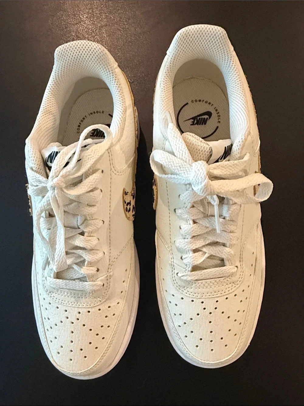 Nike Women’s White Low-Top Sneakers with Leopard Swoosh Accent